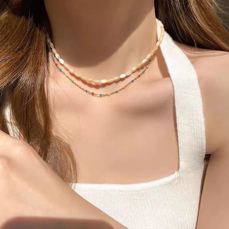Rice bead beaded necklace 2023 new style feminine light luxury niche sweet and cool pearl necklace collarbone chain accessory details Picture