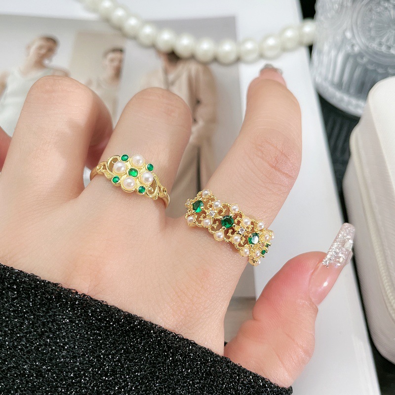 The ring features a feminine court-style lace, hollowed-out pearl inlay, adjustable ring, a niche design, and a retro, light luxury accessory trend details Picture