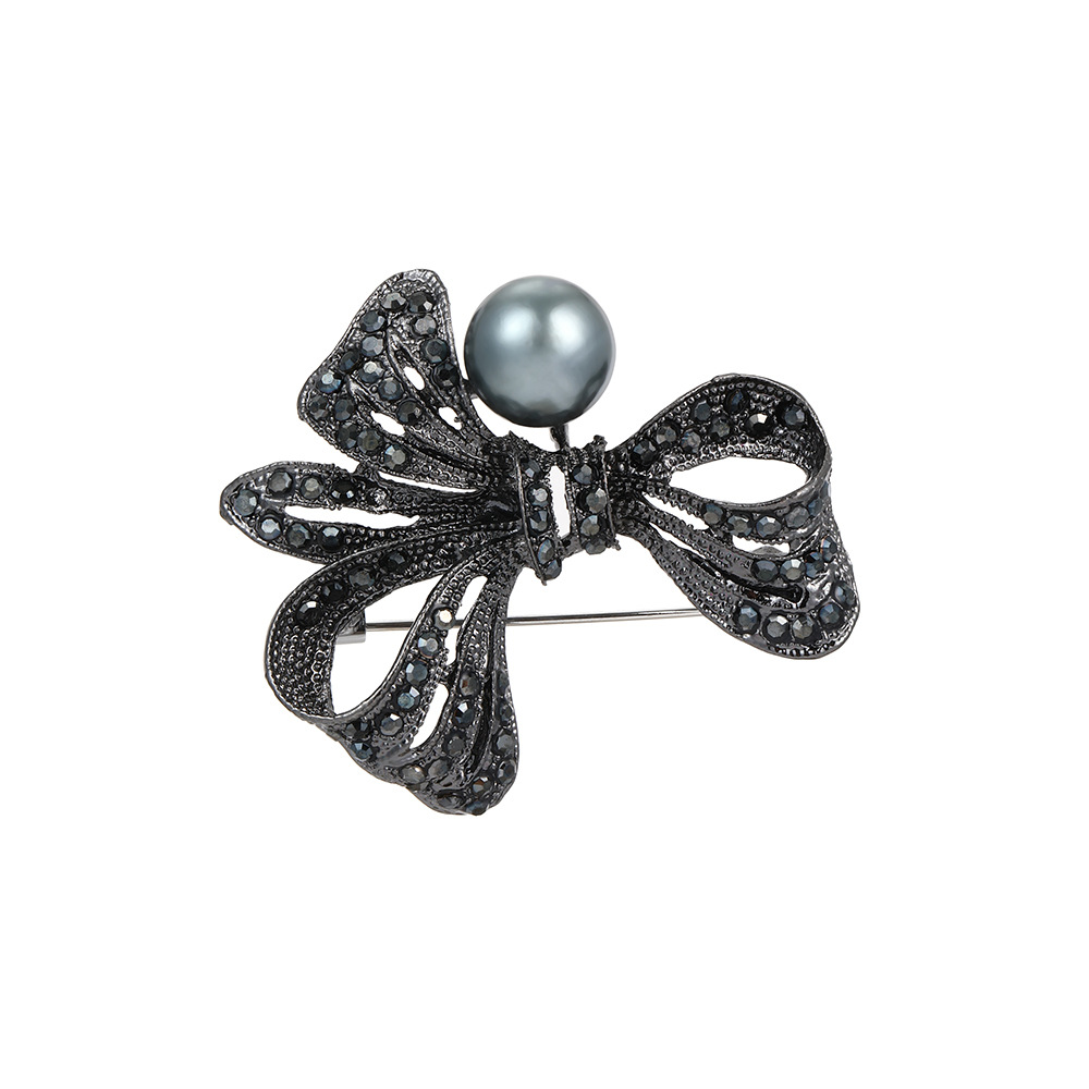 Korean-style black diamond-encrusted bow pearl brooch for women, creative design sense, fashionable suit jacket cardigan pin Item Picture