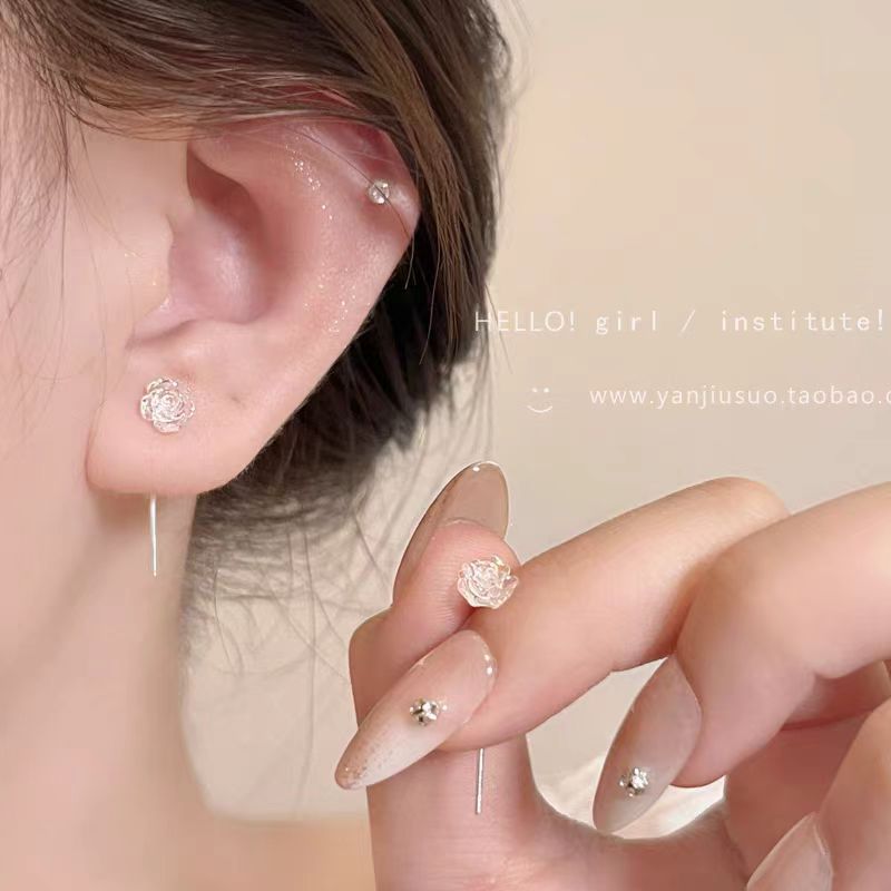 The 2025 new style of iridescent white rose ear thread women's light luxury high-end fringed ear stud elegant earrings 925 full figure
