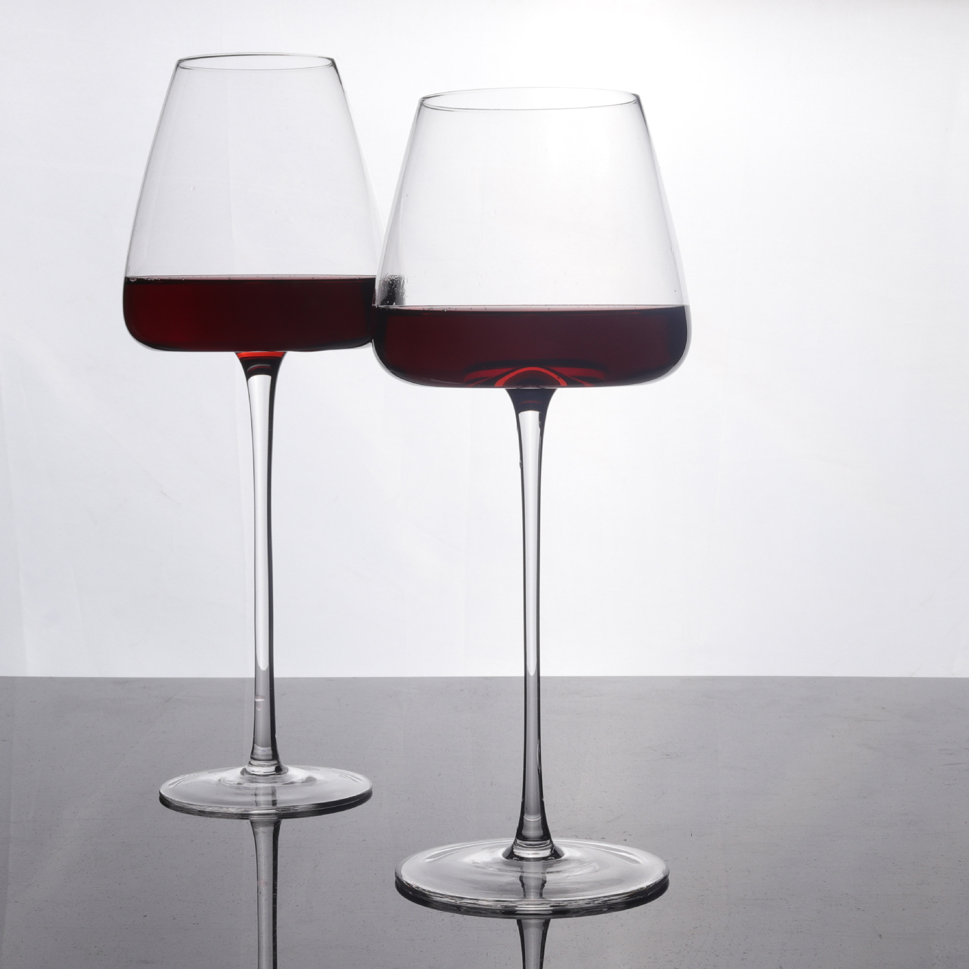 Creative handcrafted crystal concave bottom red wine glasses and champagne glasses, two color box set, home large-bellied Burgundy set details Picture