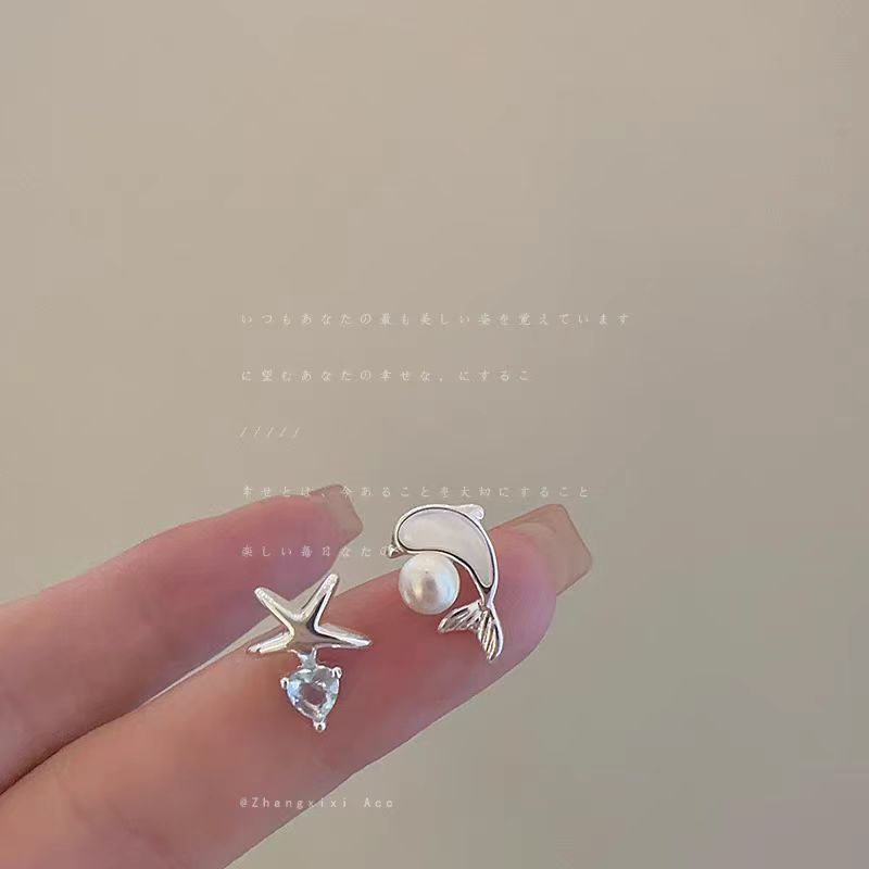 The Ocean series features exquisite, compact, asymmetrical starfish and dolphin stud earrings that are stylish, unique and versatile for women details Picture