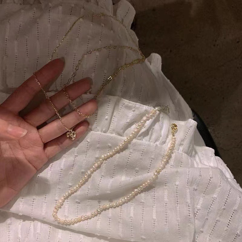 Three-layer pearl heart-shaped necklace for women's summer, with a light luxury and niche design sense collarbone chain, retro ins neck chain Application Scenario