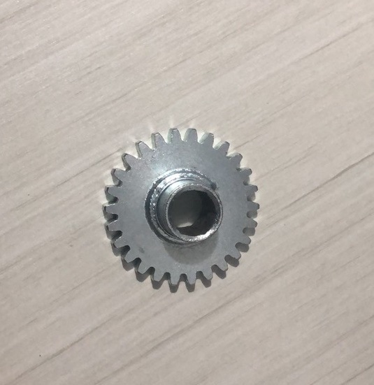The 26-tooth gear of the fertilizer box transmission sprocket of the corn planter is welded to a 20-tooth sprocket undefined