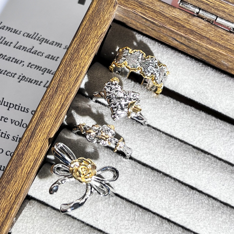 Cross-border retro two-color ginkgo leaf pleated bow flower ring, women's heart texture fashionable and niche index finger ring Specification drawing