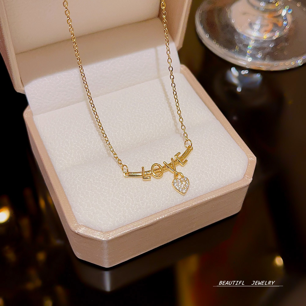 A niche heart-shaped LOVE letter necklace, a fashionable and elegant titanium steel collarbone chain by a female Internet celebrity on Instagram, and a unique cross-border accessory full figure