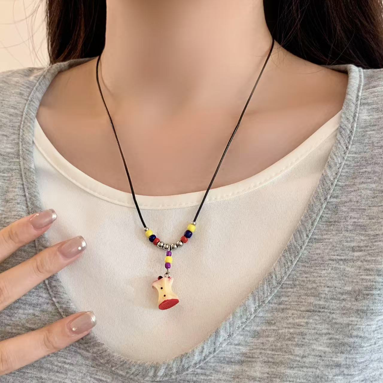 Dopamine apple core colorful beaded black rope necklace, retro and niche Korean Ink-style, cute and childlike necklace for girls Application Scenario