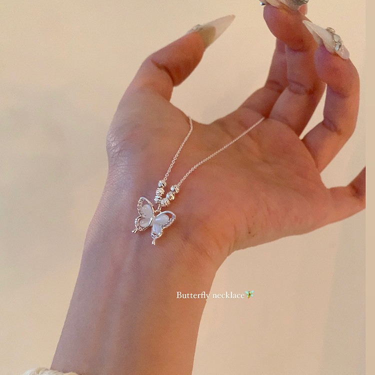A new Chinese-style cat's eye stone butterfly necklace for women, a light luxury and niche Chinese-style collarbone chain and necklace choker details Picture