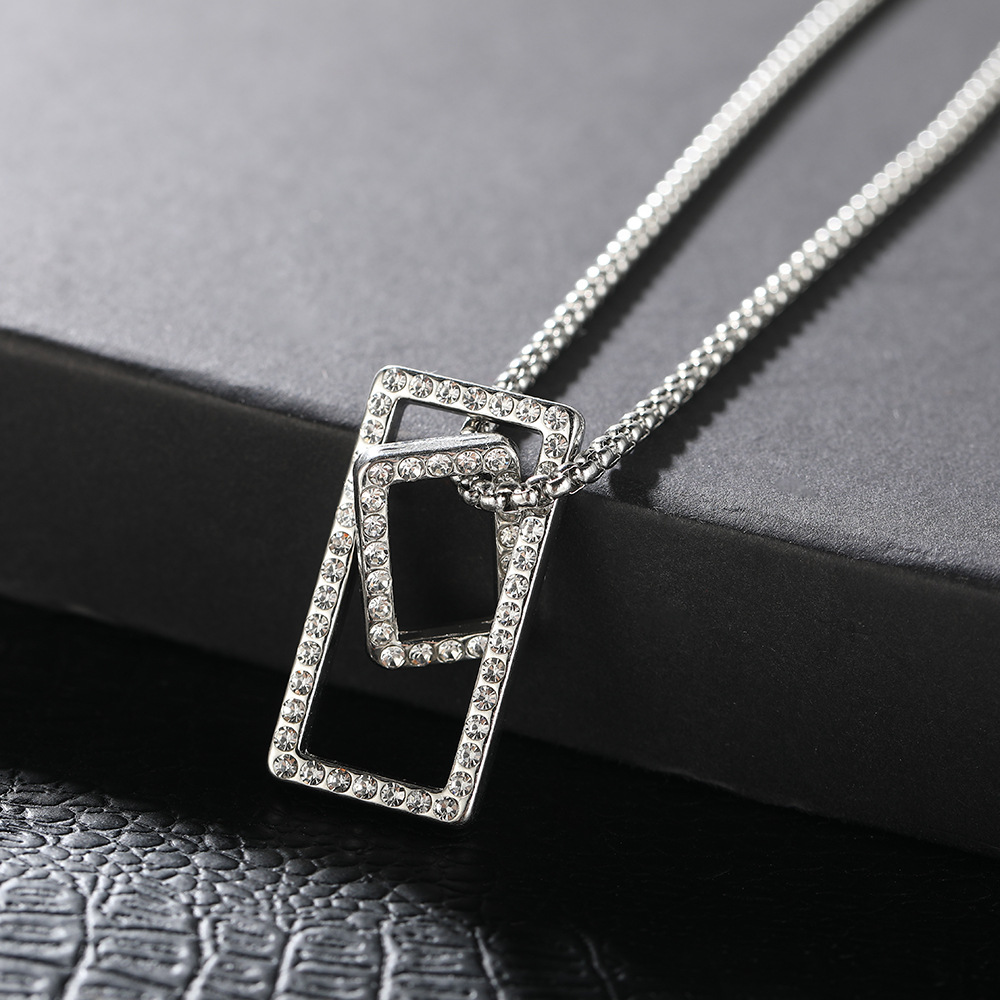 Wholesale of new cross-border square diamond-encrusted necklaces for men and women, light luxury, niche and simple geometric pendant couple sweater chains full figure