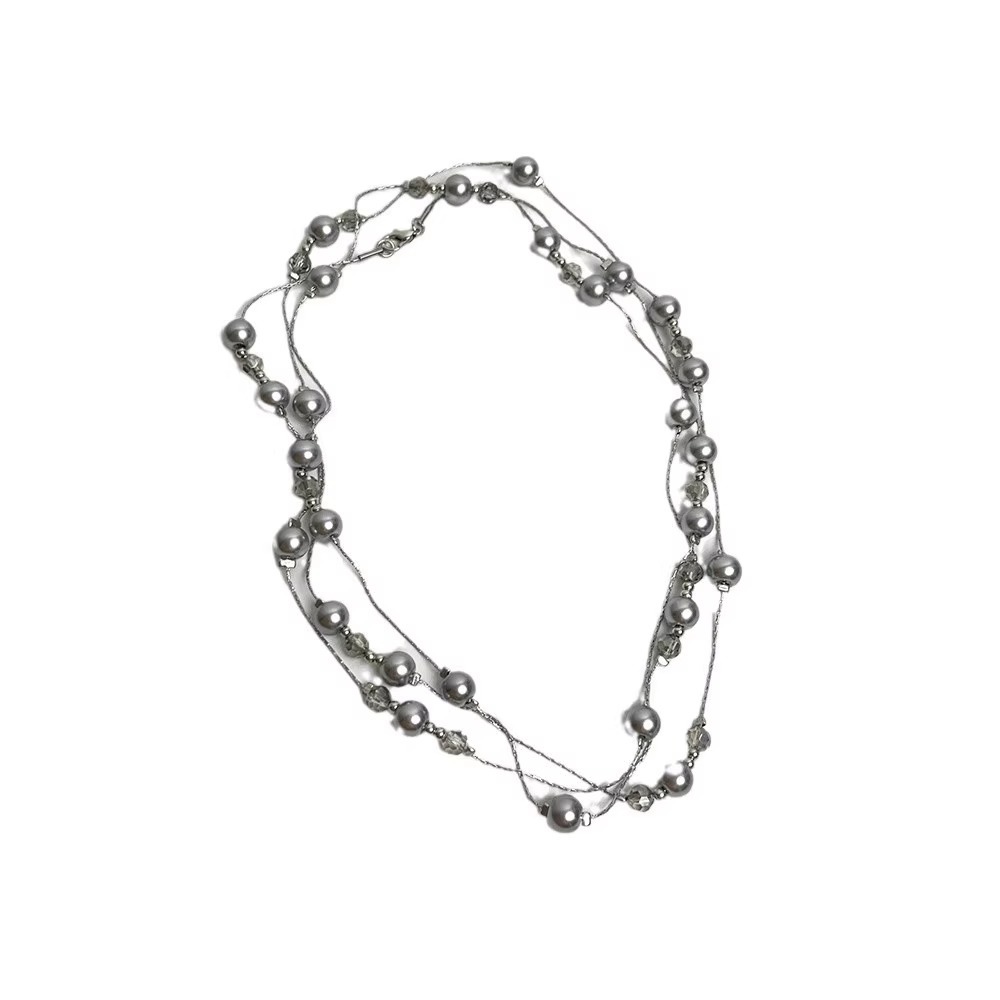This multi-layered grey pearl necklace is long and can be worn in various ways. It features a light luxury collarbone and a niche design Item Picture
