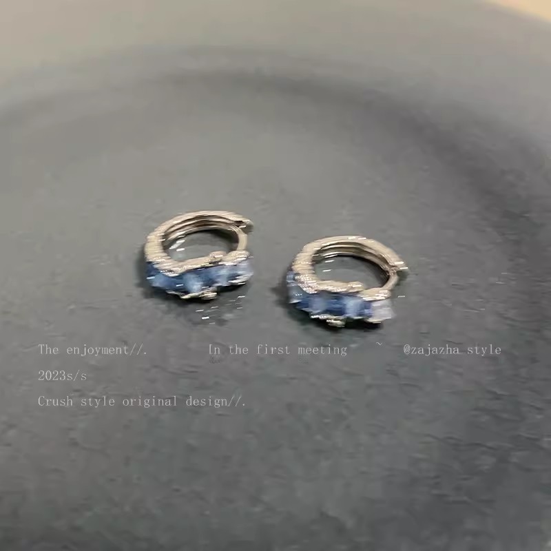 Hong Kong-style light blue zircon stud earrings, a trendy and niche design for women on Instagram, exude a sense of high-end sophistication. They are a unique, retro and individual ear accessory details Picture