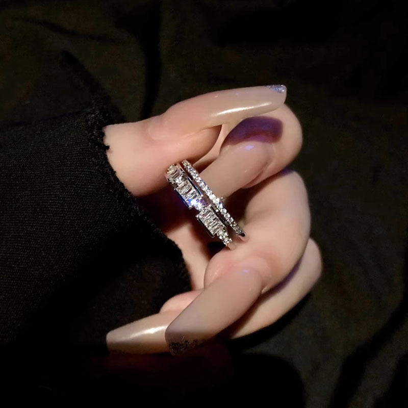 The ring is a cool and unique multi-layered zircon design on Instagram for women. It's an open ring with a sweet and cool personality Application Scenario