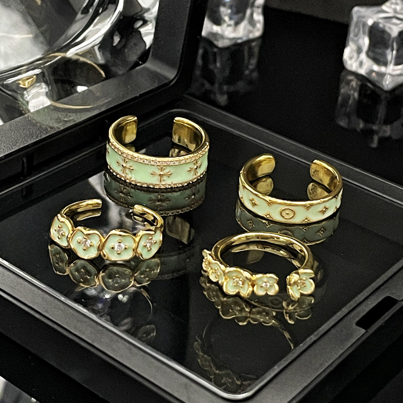 French light luxury Mambo style mint green drip glaze flower open ring, a geometric high-end and elegant fashionable ring for women Specification drawing