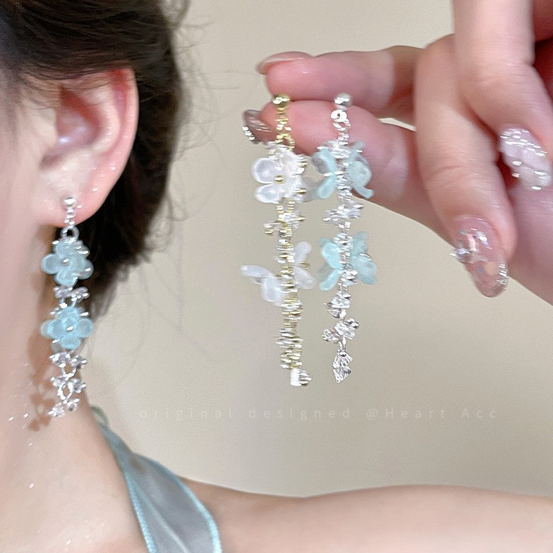 Stunning flower tassel stud earrings for women, super ethereal seaside vacation style earrings, fashionable and elegant round face earrings full figure