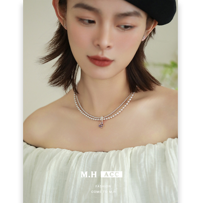 The new purple butterfly zircon pearl necklace is simple, elegant and high-end. It features a double-layered collarbone chain for women details Picture