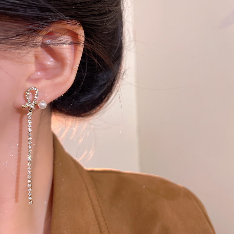 Exquisite micro-inlay bow tassel earrings for women, new design sense, popular pearl stud earrings, best-selling earrings Specification drawing