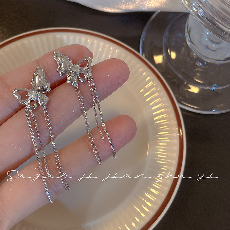 S925 Silver Needle Japanese and Korean sweet and cool butterfly tassel earrings for Women, a unique and simple cold style hot girl earrings this year full figure