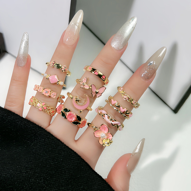 A sweet pink drip glaze open-top ring with a girlish heart, a versatile flower butterfly ring that brightens the skin and is a niche, cold style ring full figure