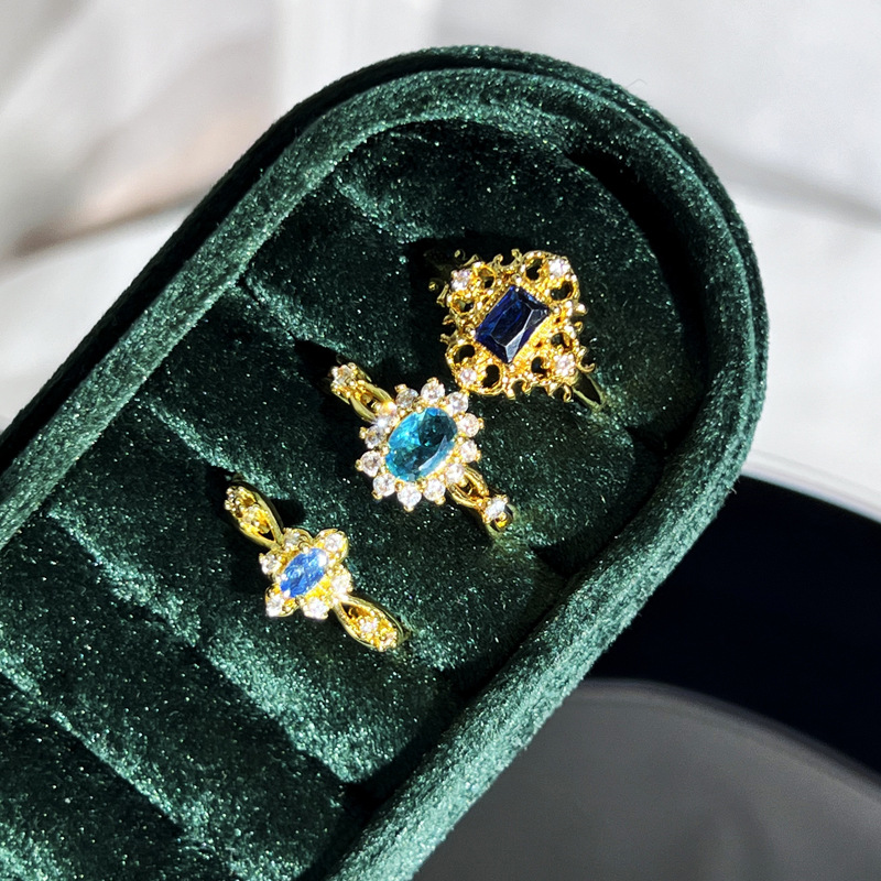 French retro blue lover's exquisite and high-end ring, women's sunflower oval zircon small and versatile index finger ring Application Scenario