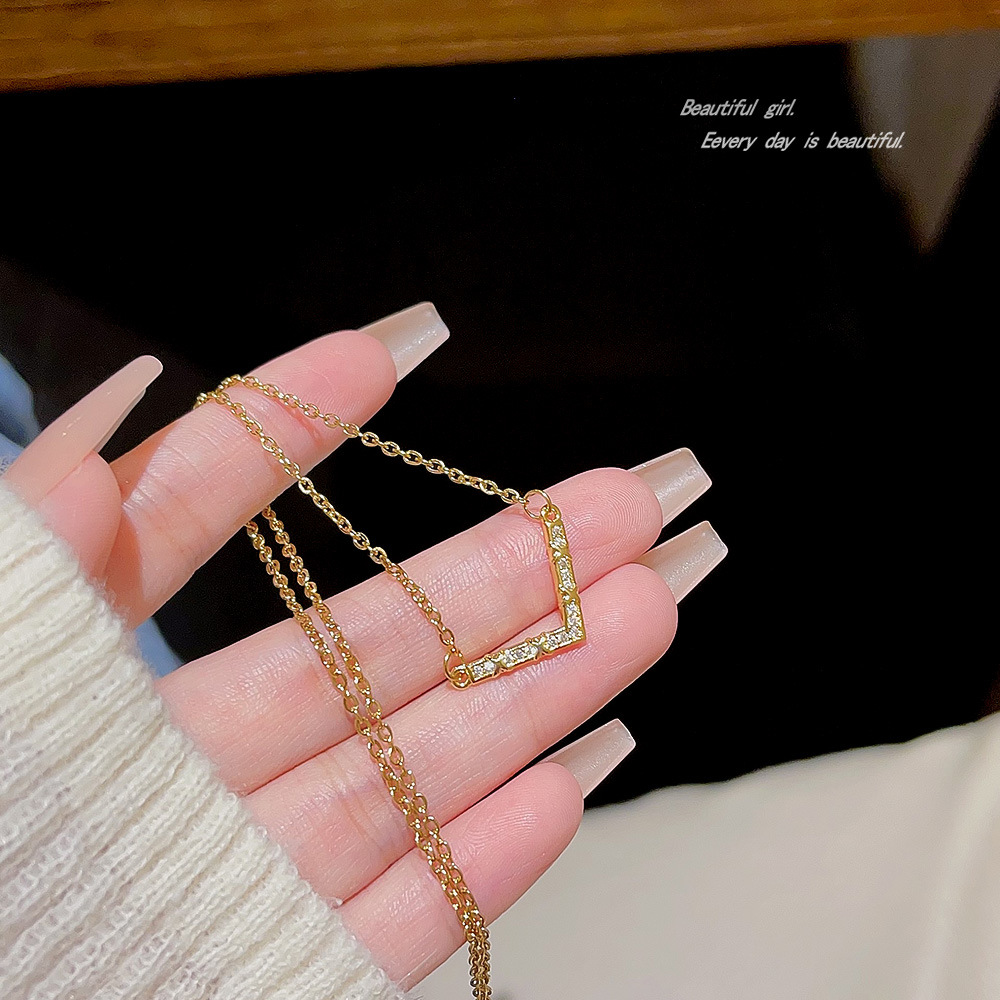 Korean simple and versatile letter necklace for women, light luxury with zircon V-shaped pendant, niche design sense, neckchain and collarbone chain Application Scenario