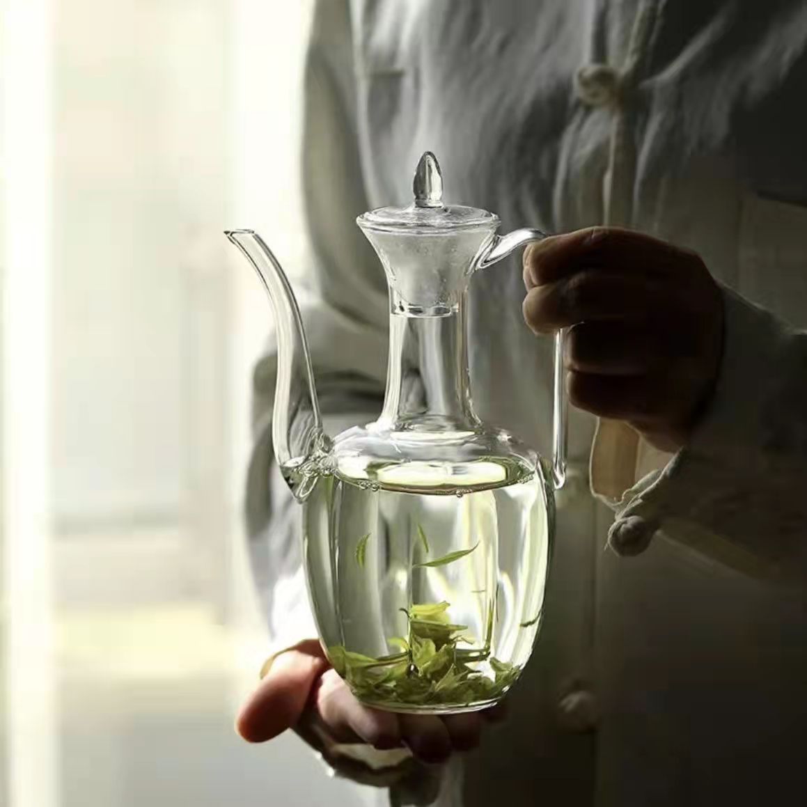 A small glass teapot in the style of the Song Dynasty, transparent for brewing green tea, a tea set for tea brewing, a household imperial concubine wine pot Specification drawing