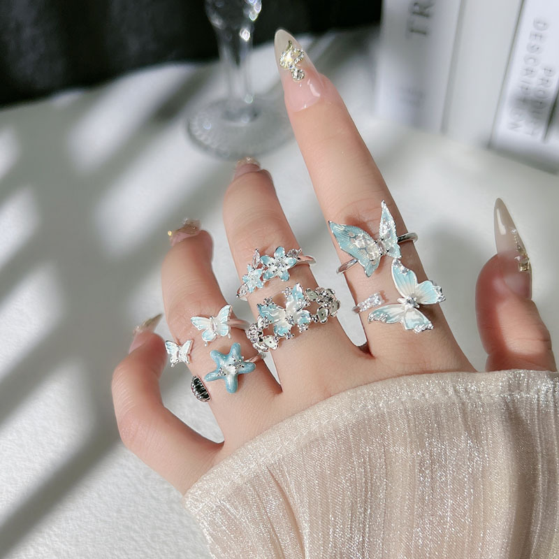 New silver-white cream style glacier blue gradient enamel butterfly opening ring, sweet and cool delicate female flower ring details Picture