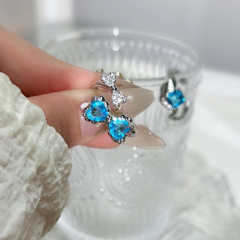 Fashionable and individual sea blue heart-shaped zircon bow open ring, a unique and niche geometric ring for women with a light luxury touch details Picture
