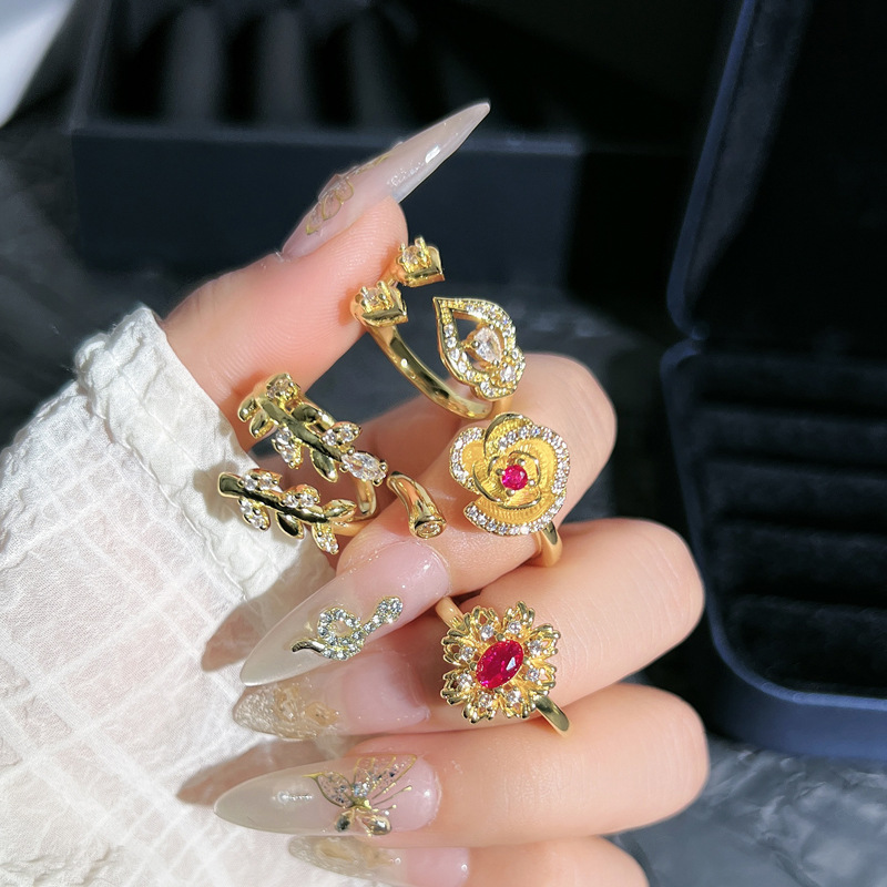 Cross-border light luxury golden flower leaf elegant open ring, women's niche fashion exquisite index finger ring, sweet and cool accessory full figure