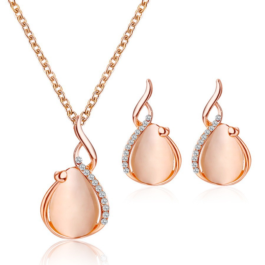 A new European and American bridal jewelry set, featuring a simple crystal cat's eye stone teardrop-shaped necklace and earrings, as a two-piece accessory Item Picture