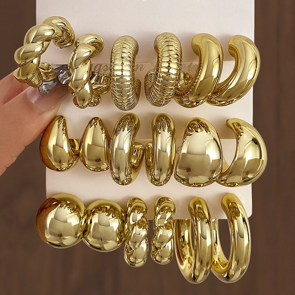 A set of 3 pairs of new high-end gold, exaggerated and unique ccb earrings with a twist pattern from Europe and America full figure