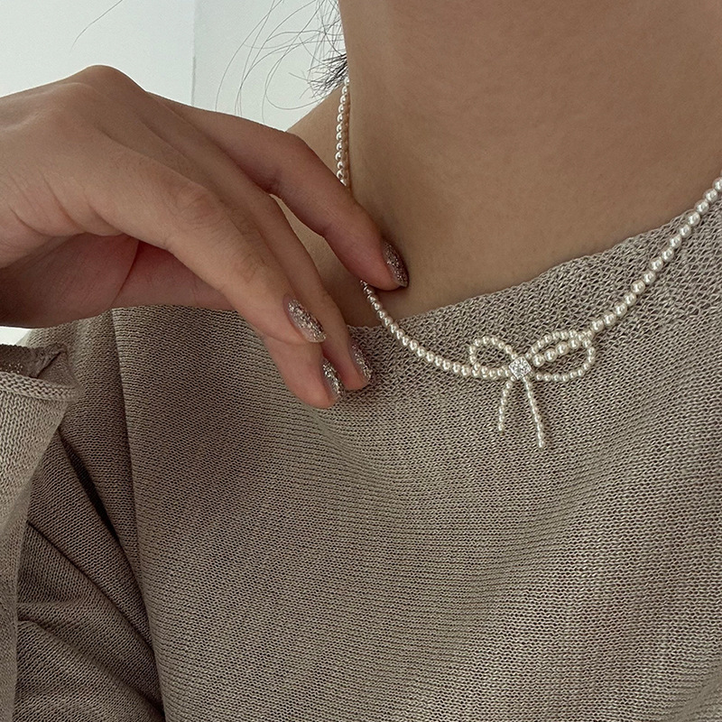 Super fairy zircon bow tassel necklace, a unique design for women, French retro style, versatile neckchain, collarbone chain full figure