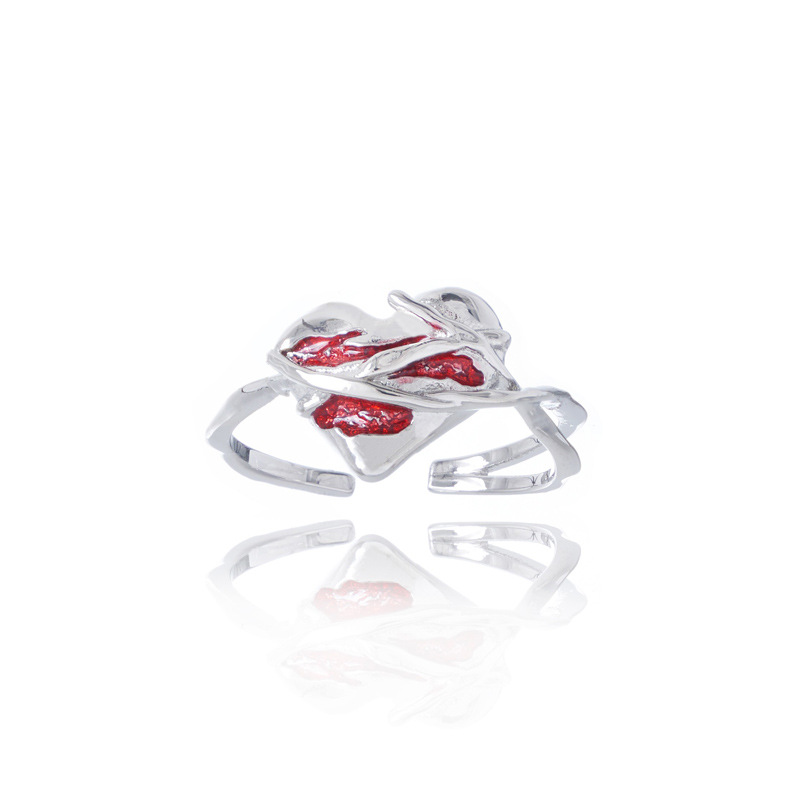 The ring features a niche design for women, an irregular thorny heart, a red drip glaze ring, and a high-end, cold style index finger ring Item Picture