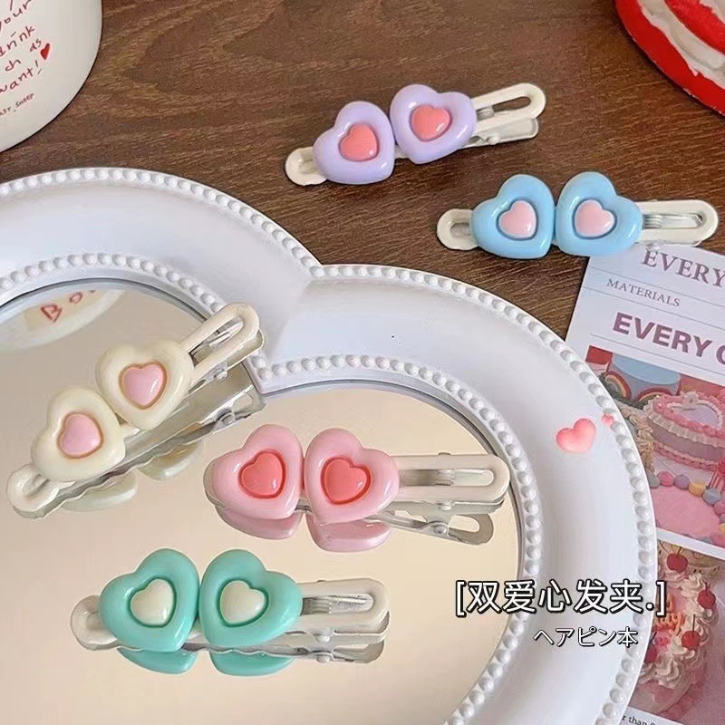 Spring's popular one-yuan hair accessories, cartoon hair clips, street stalls, night market headwear, and heartwarming girl Liu Hai seaside hair clip headwear full figure