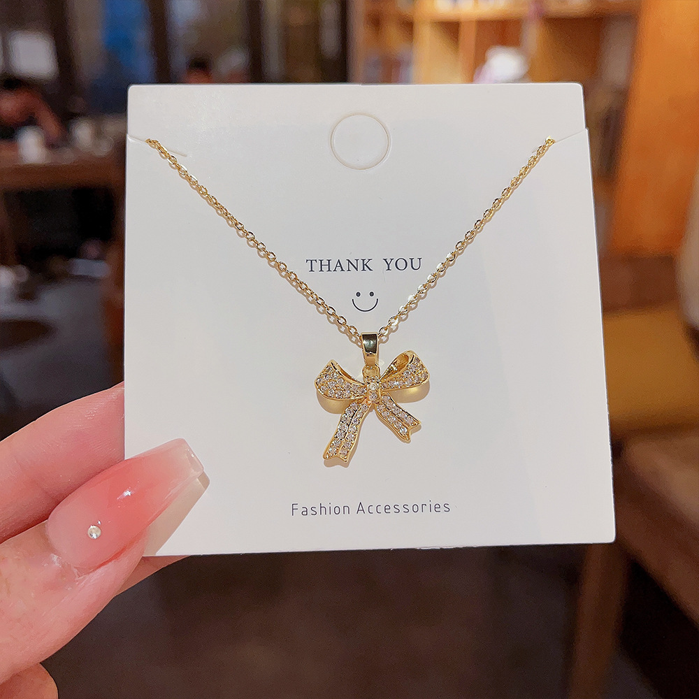 Sweet bow titanium steel necklace, women's light luxury, niche design sense, high-end collarbone chain, versatile neck chain accessory for Internet celebrities details Picture