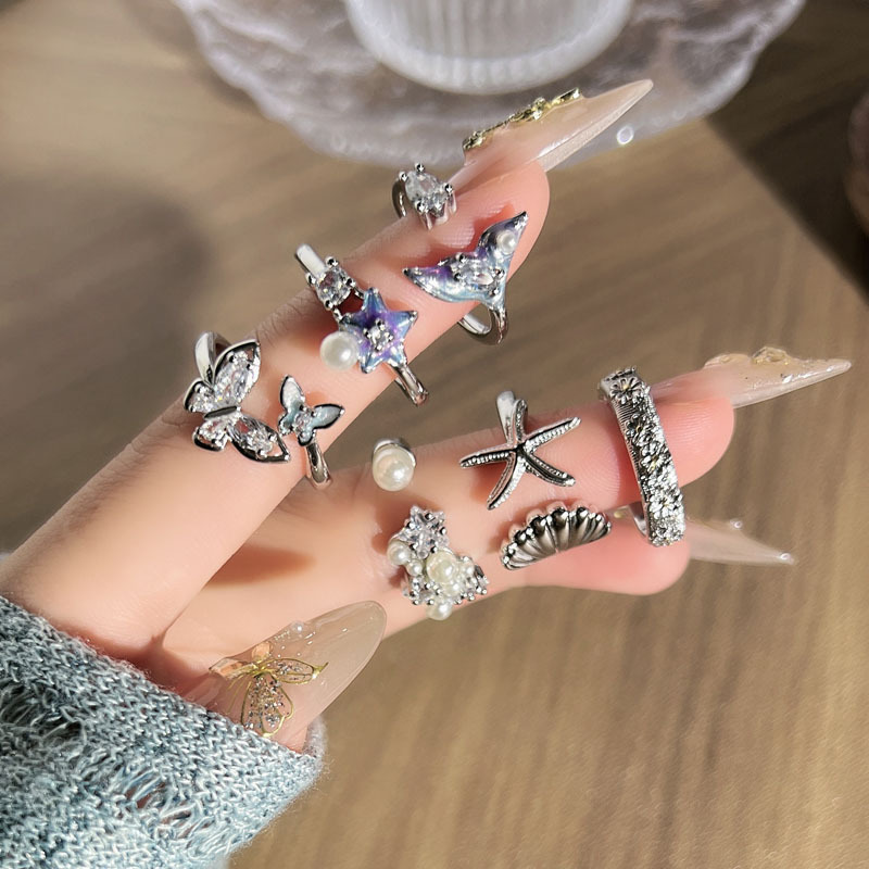 Korean-style ins starfish tail pearl ocean-themed ring, a niche and light luxury double butterfly elegant ring, summer accessories full figure