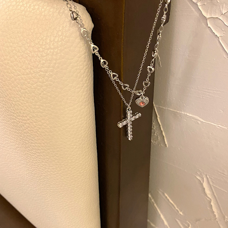 Sweet and cool style heart-shaped cross necklace for women's summer 2023 new light luxury and niche design layered collarbone chain necklace Application Scenario