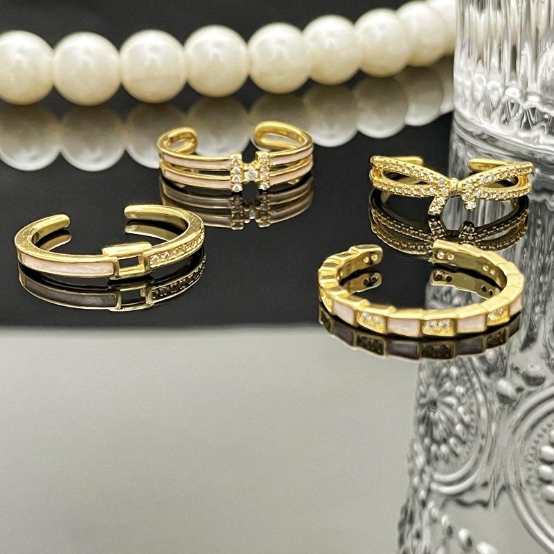 Versatile open ring, women's niche design bow letter index finger ring, light luxury, high-end, sweet and cool unique ring Specification drawing