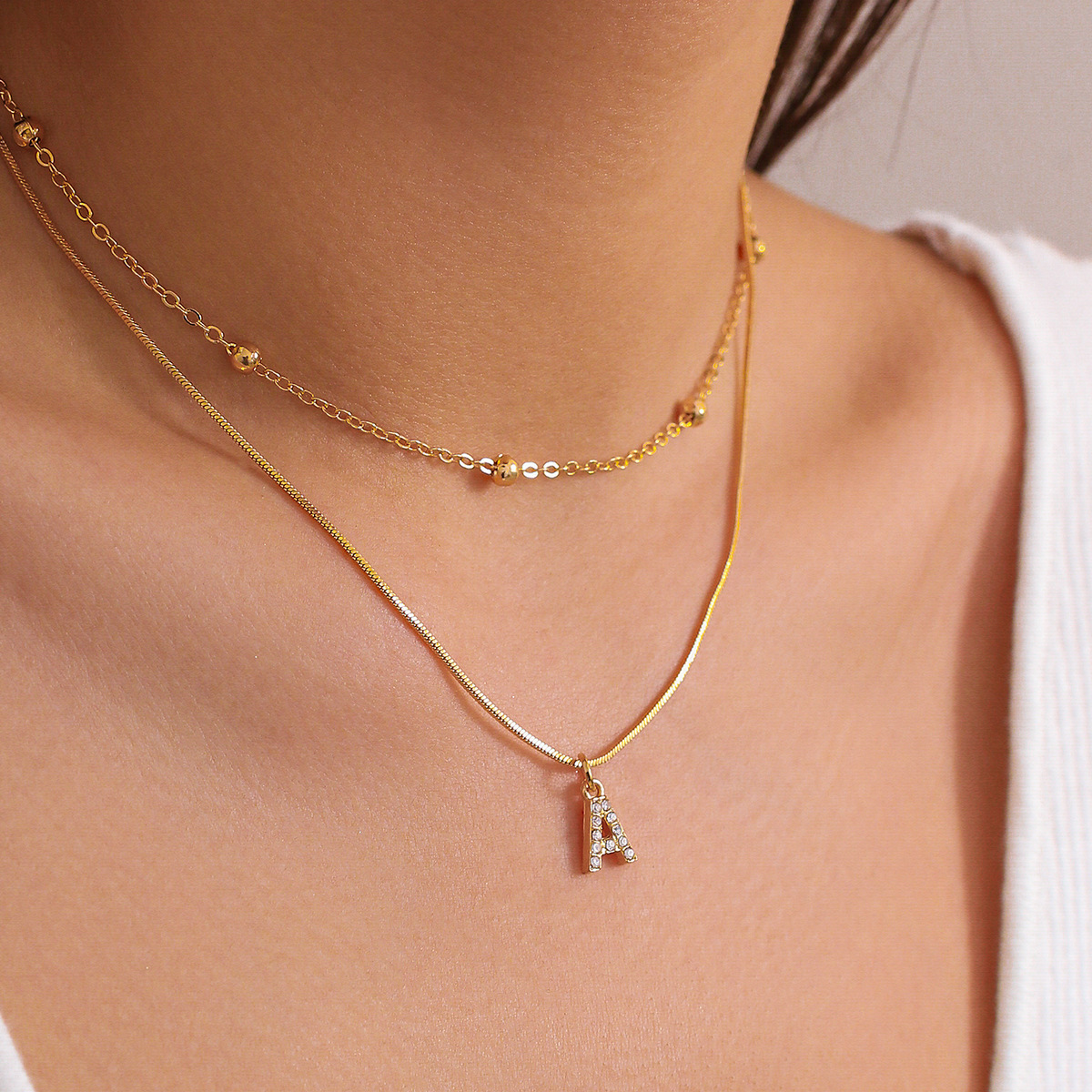 European and American cross-border simple diamond-encruted English letter pendant, double layer necklace collarbone chain, versatile snake bone necklace for women details Picture