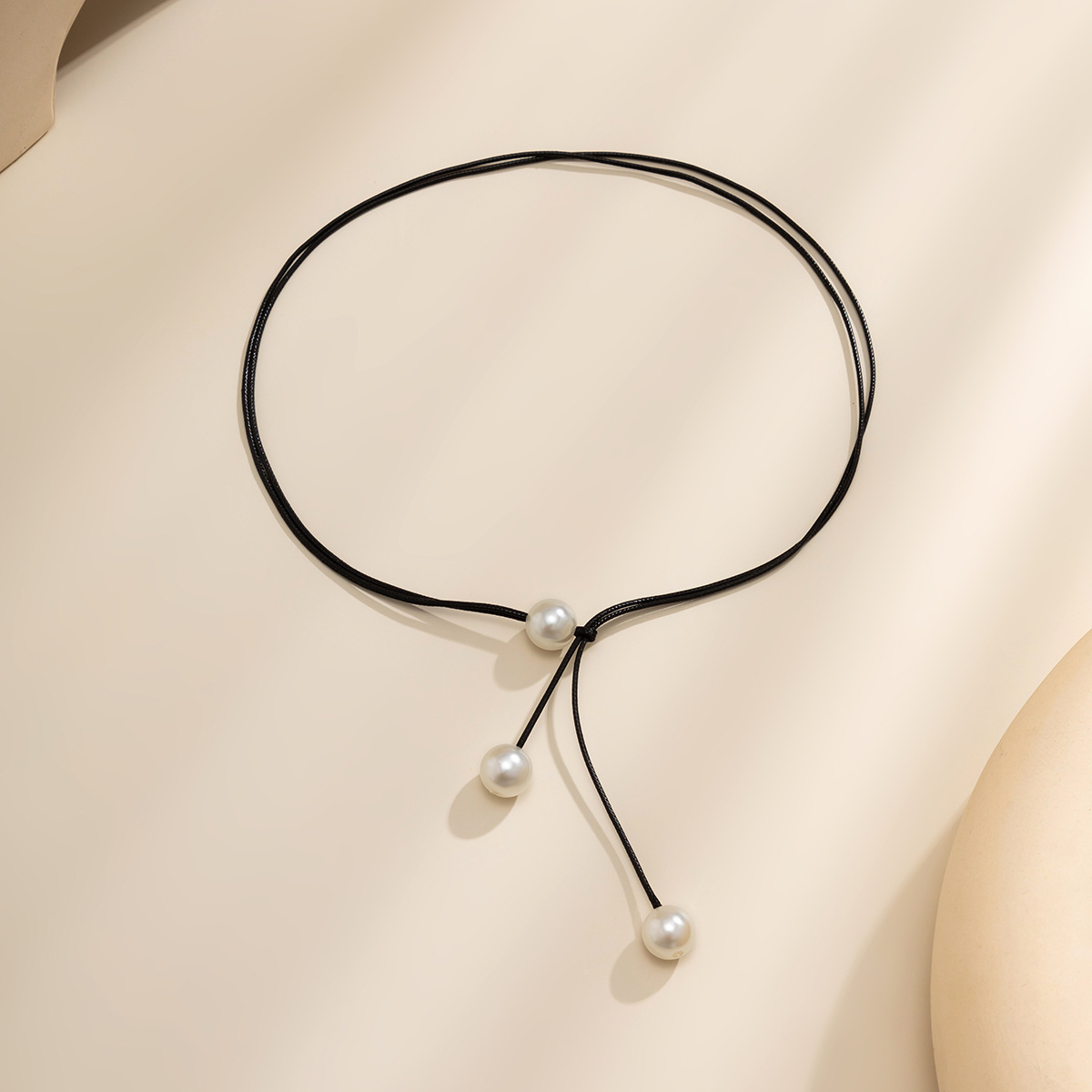 A niche and simple imitation pearl collarbone chain necklace from Europe and America, a double-layer adjustable wax thread versatile necklace Application Scenario