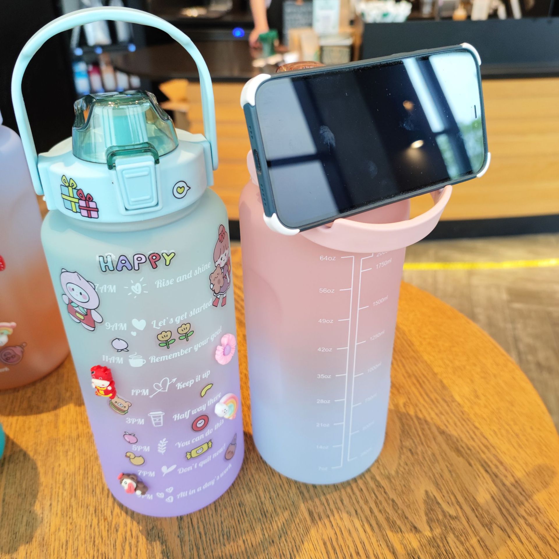 New large-capacity water bottle with gradient color, straw, sports frosted water cup, portable handle with stickers, 2000ml Application Scenario