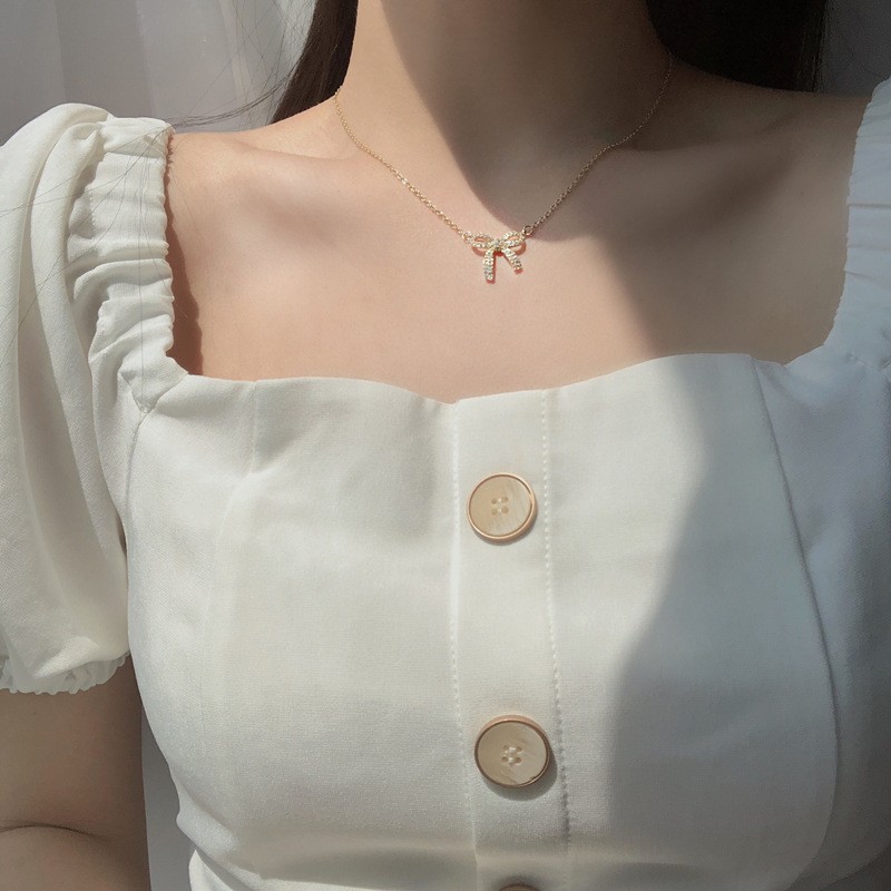 Sweet and cool hot girl micro-inlay bow pendant titanium steel necklace, female Internet celebrity's unique design sense and temperament collarbone chain wholesale Application Scenario