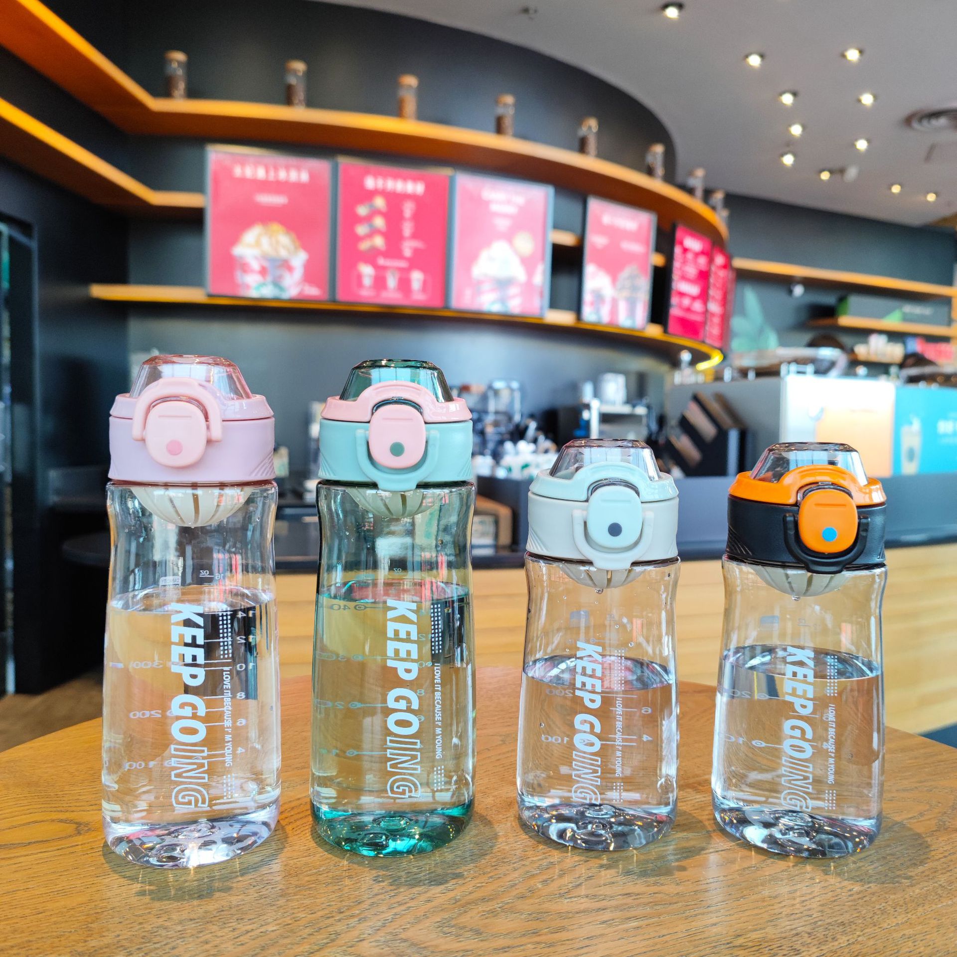 Wholesale of new Korean version outdoor portable handle plastic space cups, men's and women's sports water cups with tea strainers and direct drinking cups full figure