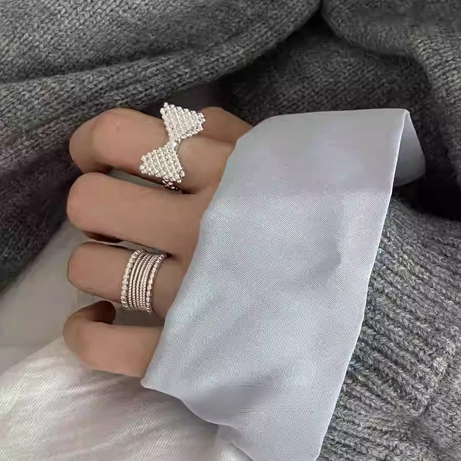 Korean bubble three-dimensional bow ring for women, S925 silver, light luxury, niche and high-end, fashionable open index finger ring Application Scenario