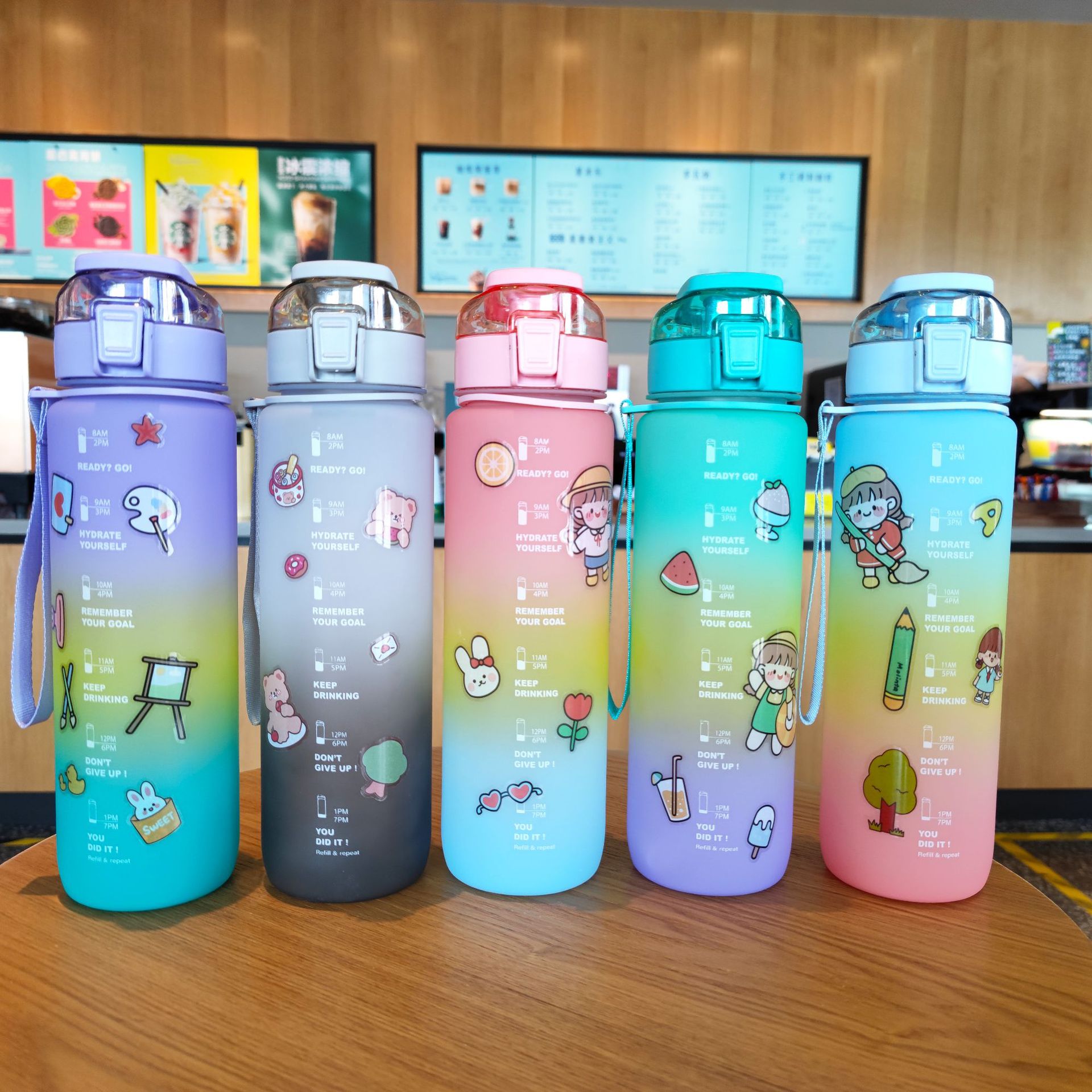 Wholesale of popular new products comes with 2D stickers, 1000ml gradient frosted straws, plastic water bottles and portable handle water cups details Picture