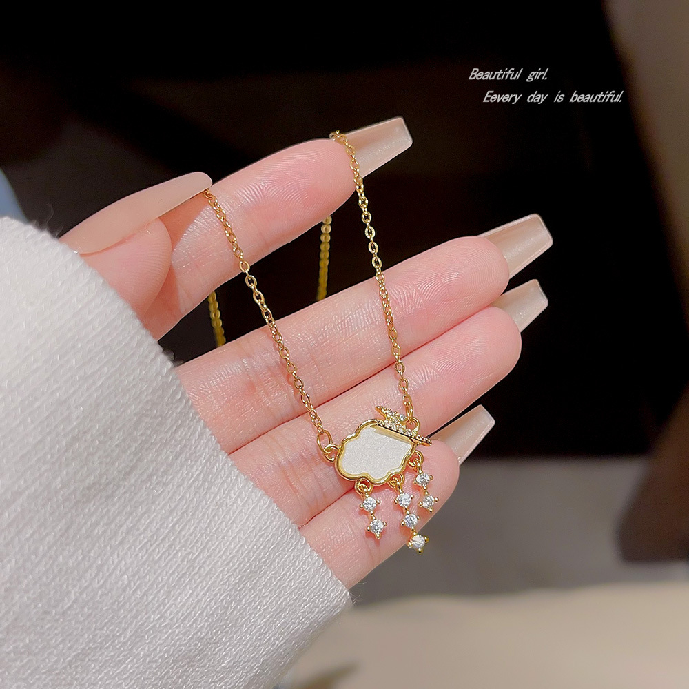 Wholesale of the new Korean internet-famous titanium steel necklace with a versatile design for women, cloud raindrop zircon pendant, collarbone chain and neck chain Specification drawing