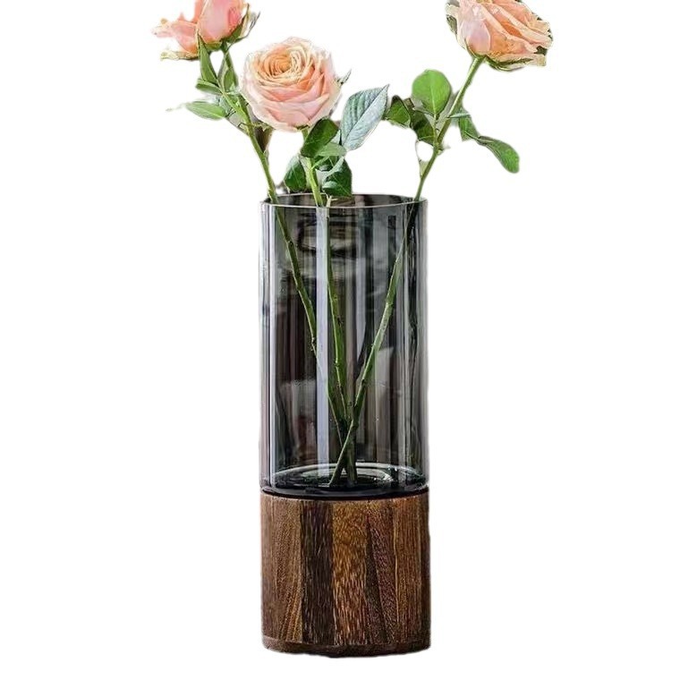 A Nordic light luxury glass vase with a wooden base and water-grown roses, a creative flower arrangement for decorating dining tables and living rooms Application Scenario