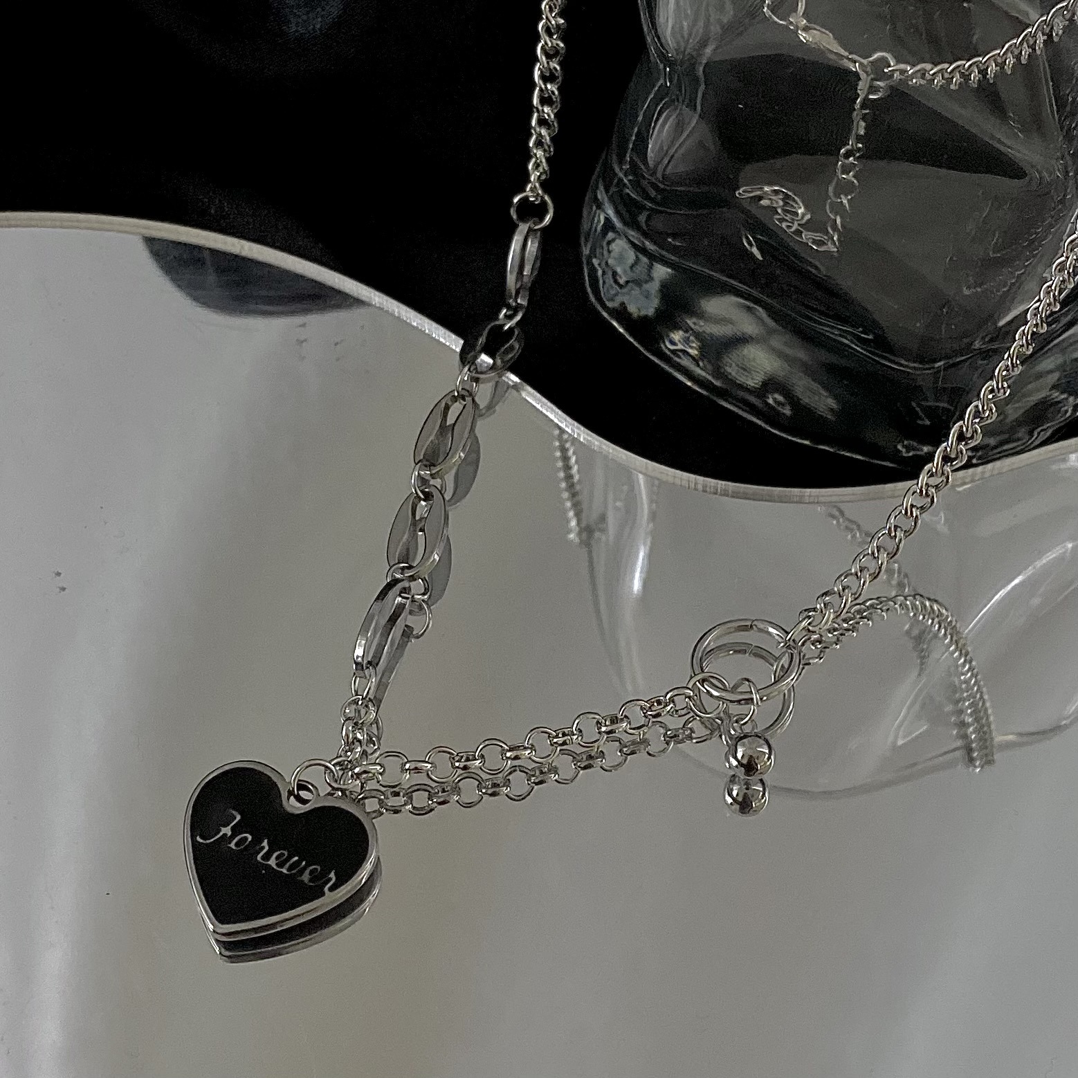 Black heart-shaped letter pendant necklace, a cool female style titanium steel non-fading accessory, an Instagram hip-hop niche collarbone chain Application Scenario