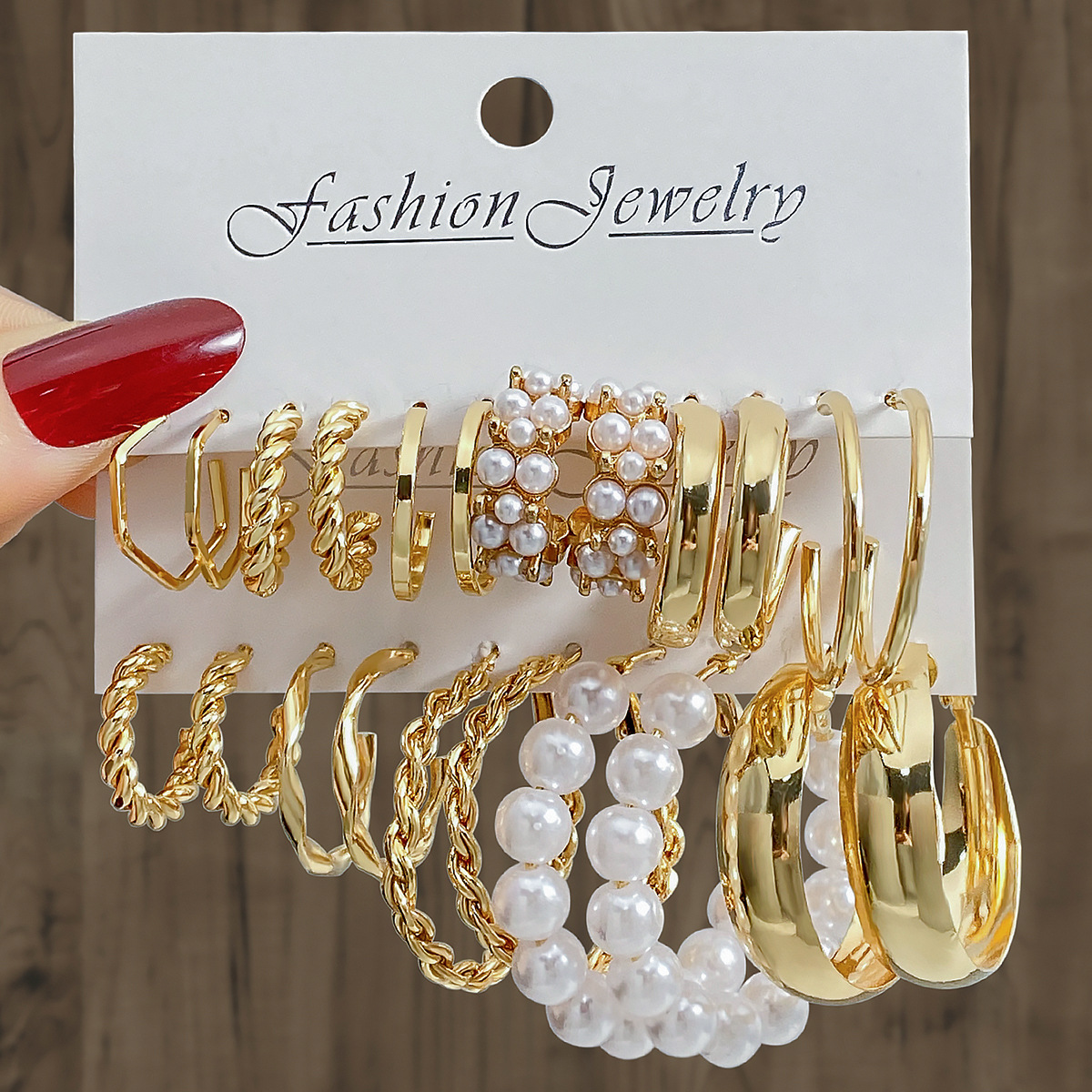 A new set of 6 pairs of retro geometric C-shaped alloy pearl earrings from Europe and America, featuring a fashionable and high-end look for women full figure