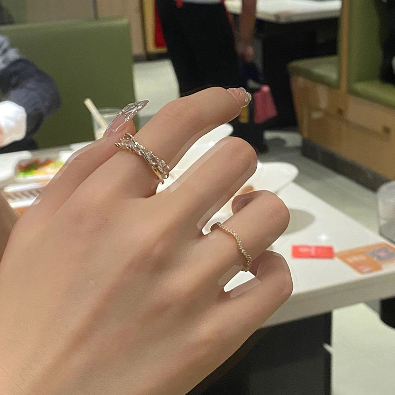 A niche design of a light luxury layered ring for women on Instagram, with a cold style and a high-end feel. It's versatile and set with zircon, featuring an open food ring details Picture