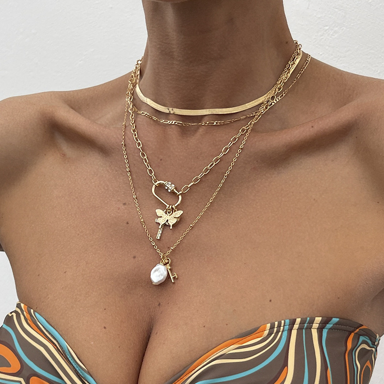 European and American cross-border jewelry, fashionable butterfly alloy flat snake chain necklace, niche and irregular-shaped pearl pendant, collarbone chain full figure